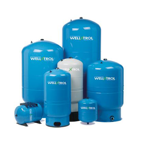 a group of well trol above ground pressure tanks